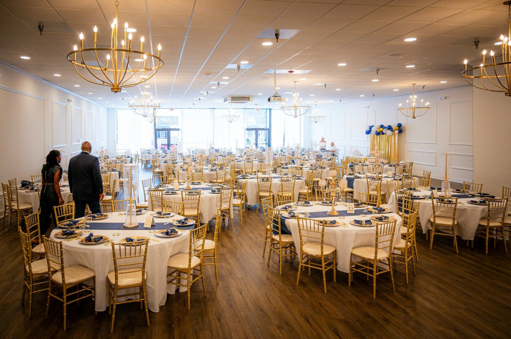 Elegant corporate gala banquet hall with formal tables