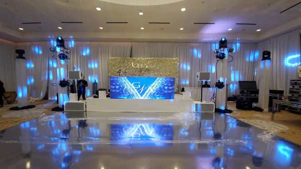 Ballroom with uplighting and a lit dance floor