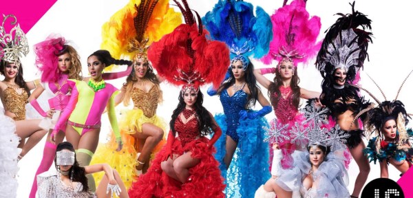 Specialty act performers in colorful feather costumes